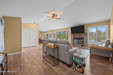 Welcome to your dream escape on the water! Nestled on wooded 2 on River Bend Golf and Country Club in North Carolina - for sale on GolfHomes.com, golf home, golf lot