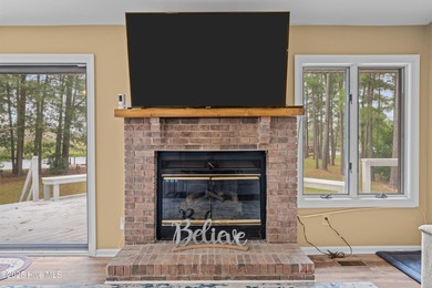 Welcome to your dream escape on the water! Nestled on wooded 2 on River Bend Golf and Country Club in North Carolina - for sale on GolfHomes.com, golf home, golf lot