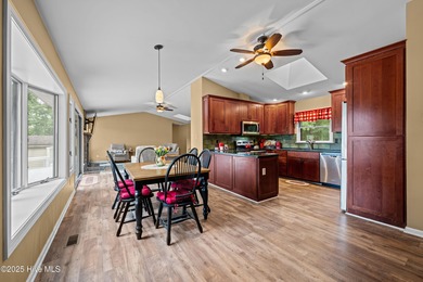 Welcome to your dream escape on the water! Nestled on wooded 2 on River Bend Golf and Country Club in North Carolina - for sale on GolfHomes.com, golf home, golf lot