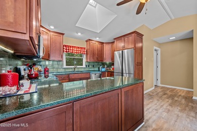 Welcome to your dream escape on the water! Nestled on wooded 2 on River Bend Golf and Country Club in North Carolina - for sale on GolfHomes.com, golf home, golf lot