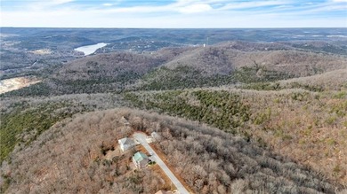 Well maintained 2 story home near beautiful Table Rock Lake sits on Holiday Island Executive Golf Course in Arkansas - for sale on GolfHomes.com, golf home, golf lot