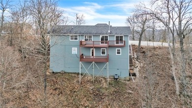 Well maintained 2 story home near beautiful Table Rock Lake sits on Holiday Island Executive Golf Course in Arkansas - for sale on GolfHomes.com, golf home, golf lot