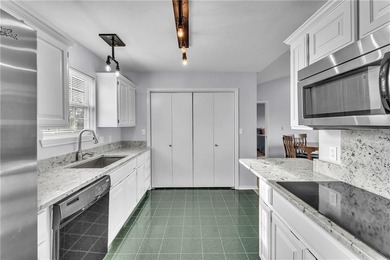 Well maintained 2 story home near beautiful Table Rock Lake sits on Holiday Island Executive Golf Course in Arkansas - for sale on GolfHomes.com, golf home, golf lot