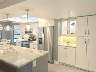 This spacious home has been remodeled and upgraded in the last 5 on Highland Lakes Executive Golf Course in Florida - for sale on GolfHomes.com, golf home, golf lot