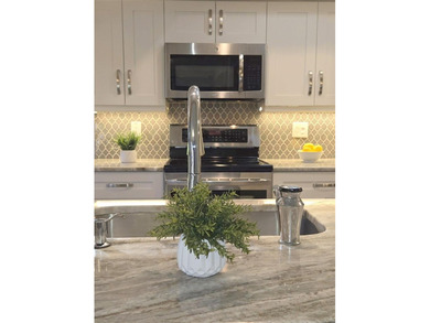 This spacious home has been remodeled and upgraded in the last 5 on Highland Lakes Executive Golf Course in Florida - for sale on GolfHomes.com, golf home, golf lot