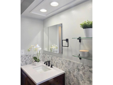 Under contract-accepting backup offers. This spacious home has on Highland Lakes Executive Golf Course in Florida - for sale on GolfHomes.com, golf home, golf lot