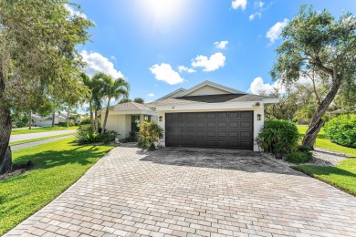 This beautifully renovated home sits on a spacious corner lot on  in Florida - for sale on GolfHomes.com, golf home, golf lot