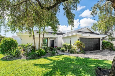 This beautifully renovated home sits on a spacious corner lot on  in Florida - for sale on GolfHomes.com, golf home, golf lot