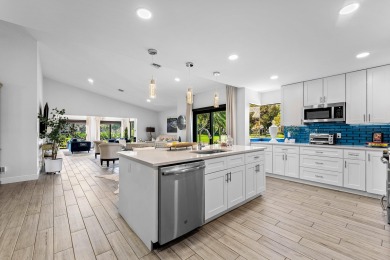 This beautifully renovated home sits on a spacious corner lot on  in Florida - for sale on GolfHomes.com, golf home, golf lot