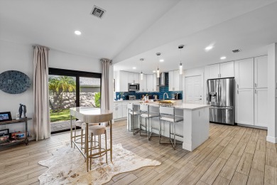 This beautifully renovated home sits on a spacious corner lot on  in Florida - for sale on GolfHomes.com, golf home, golf lot