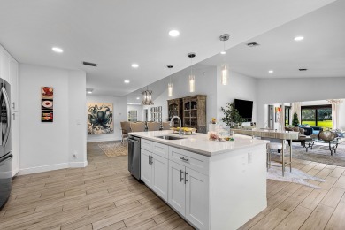 This beautifully renovated home sits on a spacious corner lot on  in Florida - for sale on GolfHomes.com, golf home, golf lot