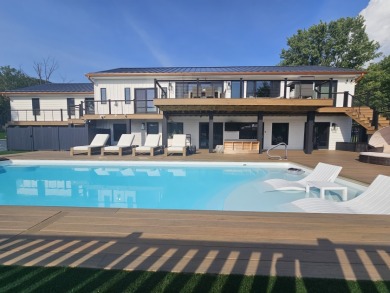 Professionally designed Lake house on a double waterfront lot on Treasure Lake - Gold in Pennsylvania - for sale on GolfHomes.com, golf home, golf lot