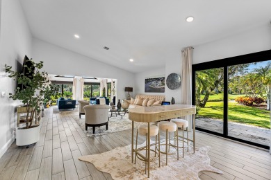 This beautifully renovated home sits on a spacious corner lot on  in Florida - for sale on GolfHomes.com, golf home, golf lot