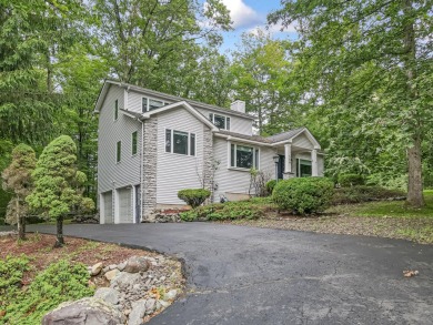 Located in the amenity-filled golf course community Country Club on Country Club of the Poconos Golf Course in Pennsylvania - for sale on GolfHomes.com, golf home, golf lot