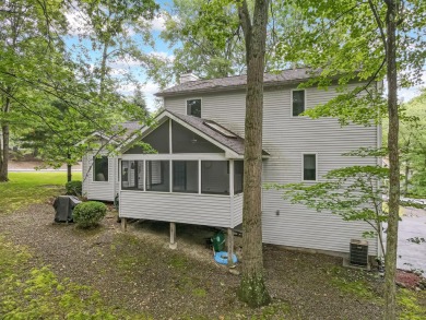 Located in the amenity-filled golf course community Country Club on Country Club of the Poconos Golf Course in Pennsylvania - for sale on GolfHomes.com, golf home, golf lot