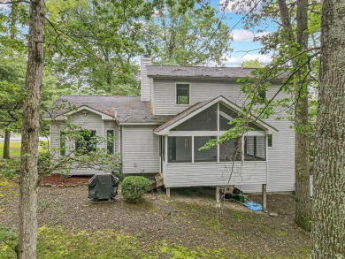 Located in the amenity-filled golf course community Country Club on Country Club of the Poconos Golf Course in Pennsylvania - for sale on GolfHomes.com, golf home, golf lot