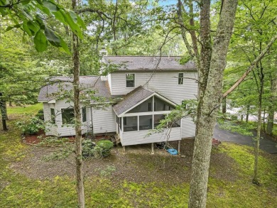 Located in the amenity-filled golf course community Country Club on Country Club of the Poconos Golf Course in Pennsylvania - for sale on GolfHomes.com, golf home, golf lot