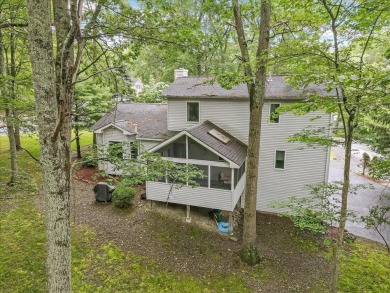 Located in the amenity-filled golf course community Country Club on Country Club of the Poconos Golf Course in Pennsylvania - for sale on GolfHomes.com, golf home, golf lot
