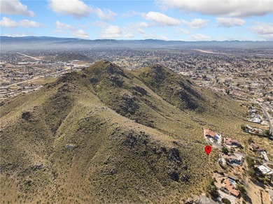 Perched at the end of a quiet cul-de-sac in desirable Apple on Apple Valley Country Club in California - for sale on GolfHomes.com, golf home, golf lot