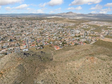 Perched at the end of a quiet cul-de-sac in desirable Apple on Apple Valley Country Club in California - for sale on GolfHomes.com, golf home, golf lot