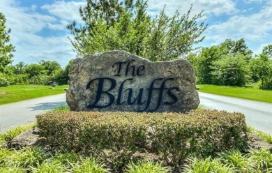 Gorgeous wooded bluff lot in the luxurious upscale gated on The Patriot in Oklahoma - for sale on GolfHomes.com, golf home, golf lot