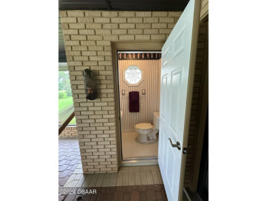 Come take a look at this beautiful 3 bedroom 2.5 bathroom solid on Spruce Creek Golf Club in Florida - for sale on GolfHomes.com, golf home, golf lot