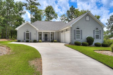 THIS FABULOUS GOLF HOME SITS OVERLOOKING THE 7TH GREEN ON THE on Monticello Golf Club At Savannah Lakes in South Carolina - for sale on GolfHomes.com, golf home, golf lot