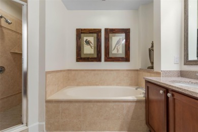 WATERFRONT ELEGANCE WITH A $15K HAMMOCK BEACH CLUB MEMBERSHIP on Hammock Dunes Club in Florida - for sale on GolfHomes.com, golf home, golf lot