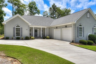 THIS FABULOUS GOLF HOME SITS OVERLOOKING THE 7TH GREEN ON THE on Monticello Golf Club At Savannah Lakes in South Carolina - for sale on GolfHomes.com, golf home, golf lot