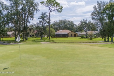 Come take a look at this beautiful 3 bedroom 2.5 bathroom solid on Spruce Creek Golf Club in Florida - for sale on GolfHomes.com, golf home, golf lot