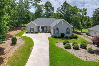 THIS FABULOUS GOLF HOME SITS OVERLOOKING THE 7TH GREEN ON THE on Monticello Golf Club At Savannah Lakes in South Carolina - for sale on GolfHomes.com, golf home, golf lot