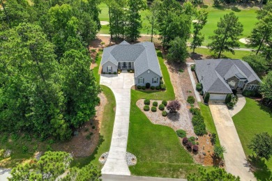 THIS FABULOUS GOLF HOME SITS OVERLOOKING THE 7TH GREEN ON THE on Monticello Golf Club At Savannah Lakes in South Carolina - for sale on GolfHomes.com, golf home, golf lot