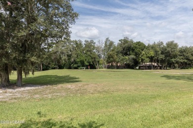 Come take a look at this beautiful 3 bedroom 2.5 bathroom solid on Spruce Creek Golf Club in Florida - for sale on GolfHomes.com, golf home, golf lot