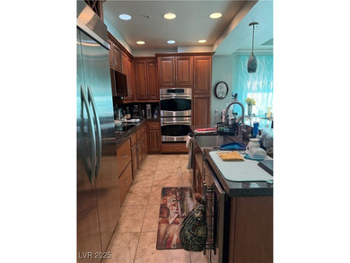 Gorgeous 2BD/2BA 1st floor unit with 250SF wraparound covered on Reflection Bay Golf Club in Nevada - for sale on GolfHomes.com, golf home, golf lot