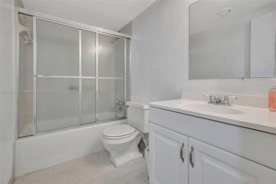 BEAUTIFUL 2/2 CONDO   - ENCLOSED AND SCREENED BALCONY WITH VIEW on Inverrary Country Club in Florida - for sale on GolfHomes.com, golf home, golf lot