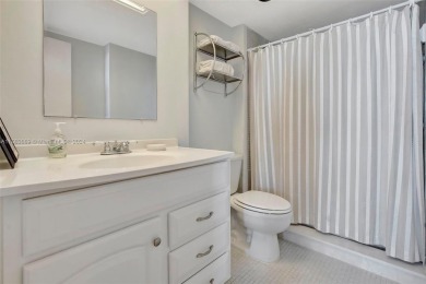 BEAUTIFUL 2/2 CONDO   - ENCLOSED AND SCREENED BALCONY WITH VIEW on Inverrary Country Club in Florida - for sale on GolfHomes.com, golf home, golf lot