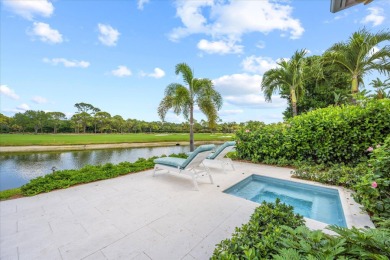 Exceptional Loxahatchee Club lake and golf course views can be on The Loxahatchee Club in Florida - for sale on GolfHomes.com, golf home, golf lot