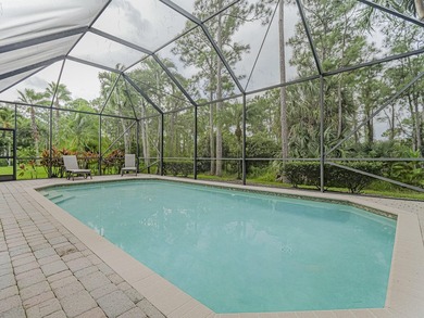 This exceptional 3-bedroom, 2-bathroom screened Pool home with on Champions Club at Summerfield in Florida - for sale on GolfHomes.com, golf home, golf lot