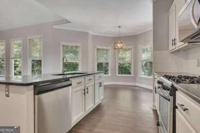 Spacious home nestled in the sought-after Bridgemill community on Bridgemill Golf Club in Georgia - for sale on GolfHomes.com, golf home, golf lot