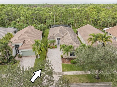 This exceptional 3-bedroom, 2-bathroom screened Pool home with on Champions Club at Summerfield in Florida - for sale on GolfHomes.com, golf home, golf lot