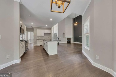 Spacious home nestled in the sought-after Bridgemill community on Bridgemill Golf Club in Georgia - for sale on GolfHomes.com, golf home, golf lot