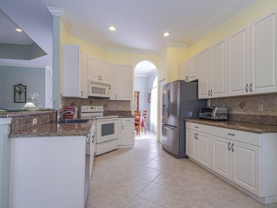 This exceptional 3-bedroom, 2-bathroom screened Pool home with on Champions Club at Summerfield in Florida - for sale on GolfHomes.com, golf home, golf lot