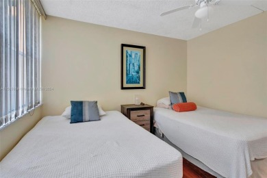 BEAUTIFUL 2/2 CONDO   - ENCLOSED AND SCREENED BALCONY WITH VIEW on Inverrary Country Club in Florida - for sale on GolfHomes.com, golf home, golf lot