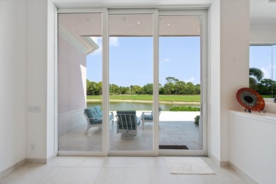 Exceptional Loxahatchee Club lake and golf course views can be on The Loxahatchee Club in Florida - for sale on GolfHomes.com, golf home, golf lot