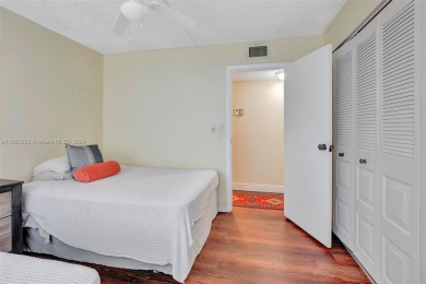 BEAUTIFUL 2/2 CONDO   - ENCLOSED AND SCREENED BALCONY WITH VIEW on Inverrary Country Club in Florida - for sale on GolfHomes.com, golf home, golf lot