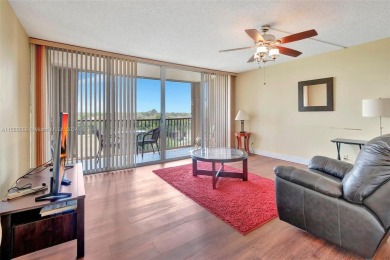 BEAUTIFUL 2/2 CONDO   - ENCLOSED AND SCREENED BALCONY WITH VIEW on Inverrary Country Club in Florida - for sale on GolfHomes.com, golf home, golf lot