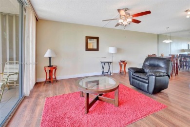 BEAUTIFUL 2/2 CONDO   - ENCLOSED AND SCREENED BALCONY WITH VIEW on Inverrary Country Club in Florida - for sale on GolfHomes.com, golf home, golf lot
