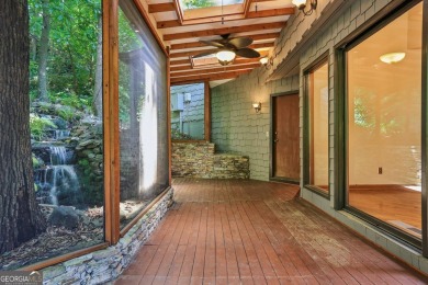 Tucked in the quiet interior of Atlanta Country Club's Back 9 on Atlanta Country Club in Georgia - for sale on GolfHomes.com, golf home, golf lot