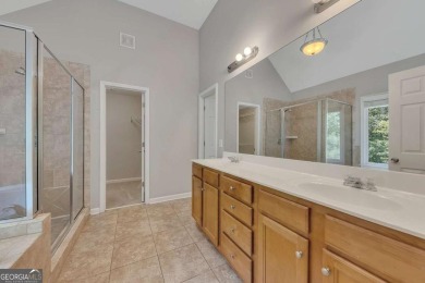 Spacious home nestled in the sought-after Bridgemill community on Bridgemill Golf Club in Georgia - for sale on GolfHomes.com, golf home, golf lot