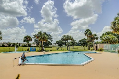 BEAUTIFUL 2/2 CONDO   - ENCLOSED AND SCREENED BALCONY WITH VIEW on Inverrary Country Club in Florida - for sale on GolfHomes.com, golf home, golf lot